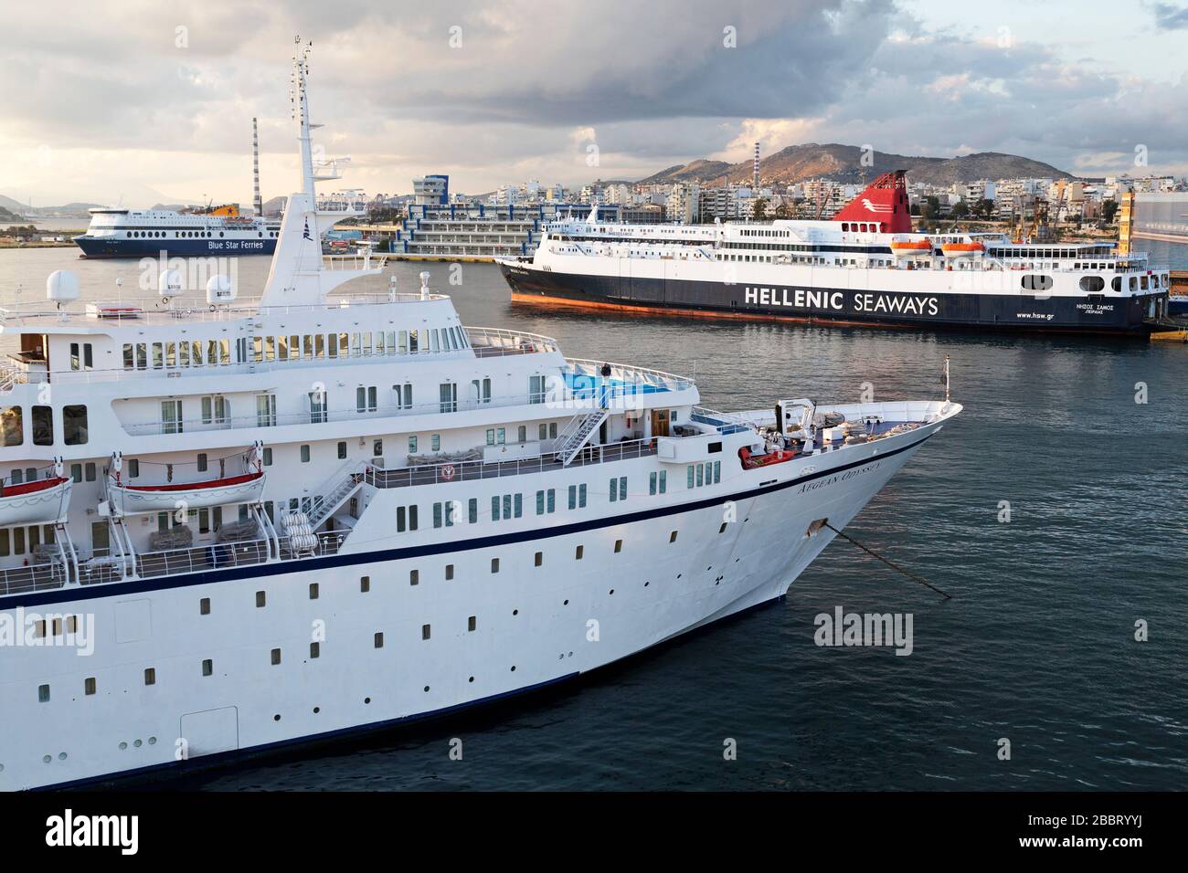 The Mv Aegean Odyssey Cruise Ship And A Hellenic Seaways Ferry In The Port Of Piraeus In Greece Stock Photo Alamy