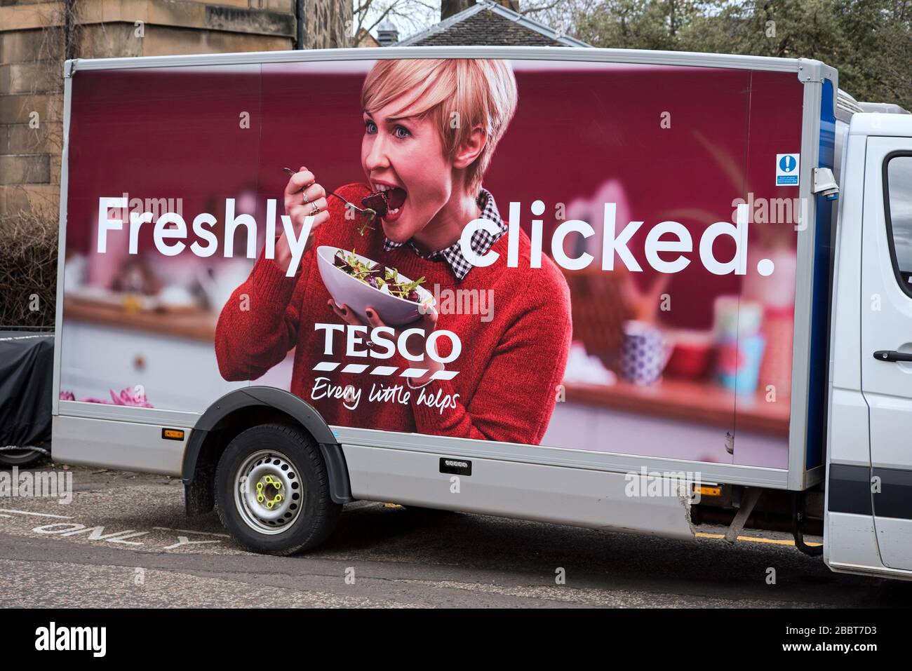 Freshly Clicked Tesco advert on the side of a Tesco delivery van in New Town, Edinburgh, Scotland, UK. Stock Photo