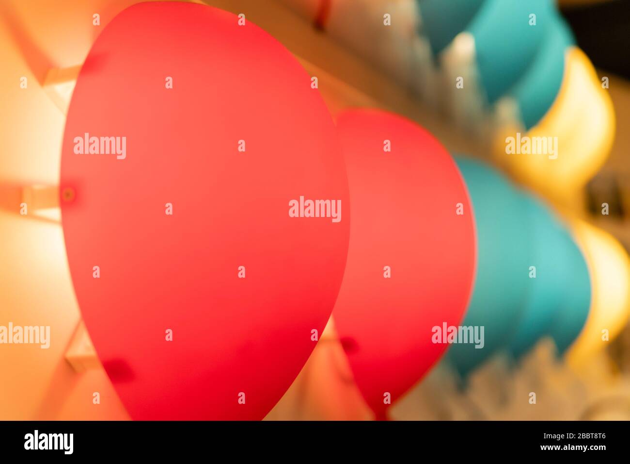 beautiful red and blue lamps in the decor Stock Photo Alamy