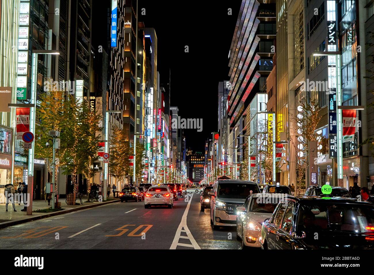 Busy traffic in Tokyo at night Stock Photo