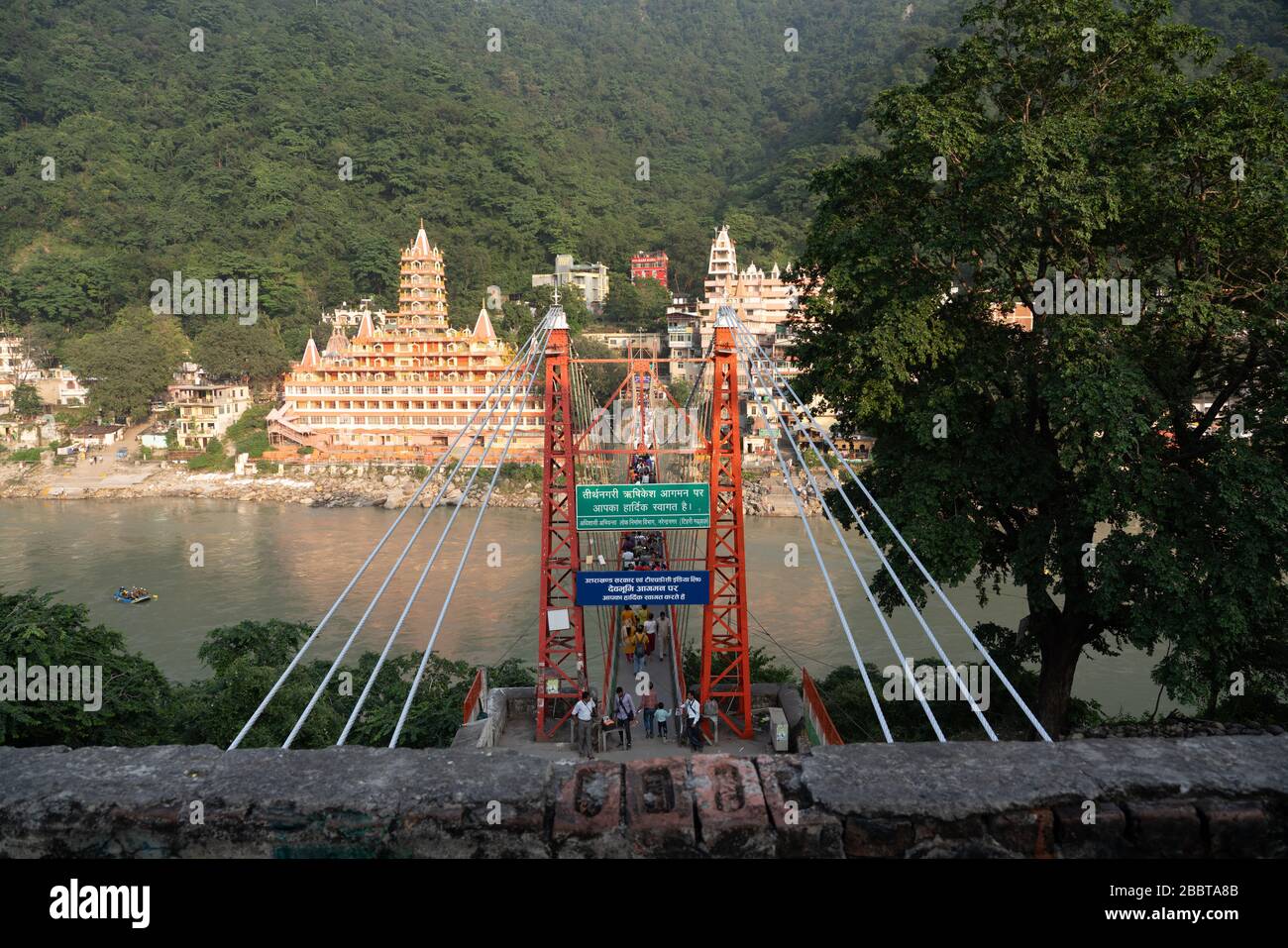 Rishikesh city, India, Oct 2018: Ganges bridge river view Stock Photo