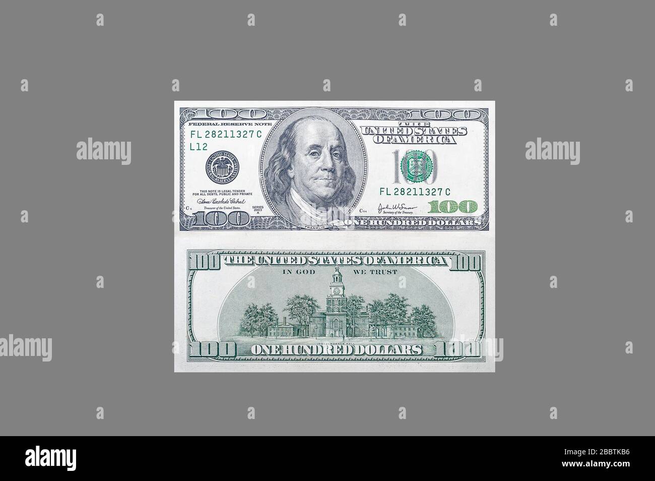 Front and back side of one hundred US dollar banknote with portrait of american president benjamin franklin on isolated gray background Stock Photo