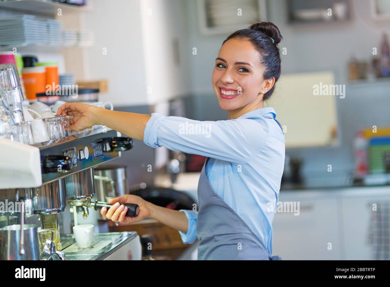 Female barista making coffee Stock Photo Alamy