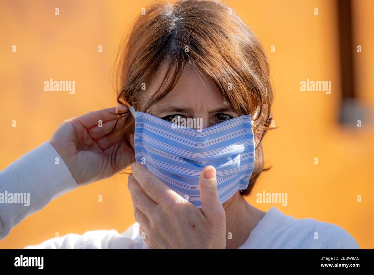 Woman wearing breathing mask hi-res stock photography and images - Alamy