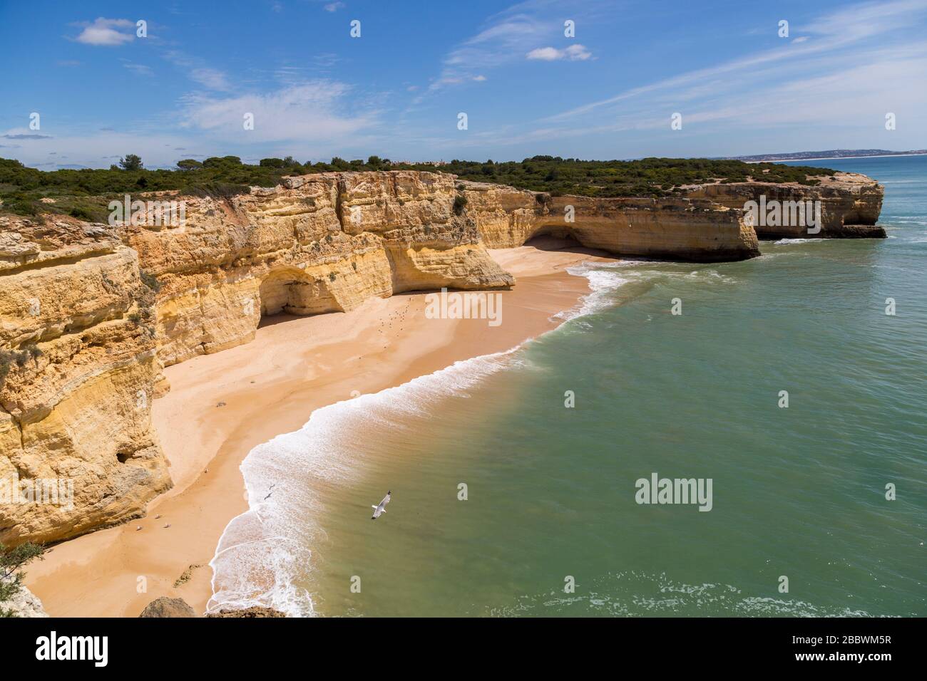Deserted beach on the coast west of Alporchinhas, Algarve, Portugal Stock Photo