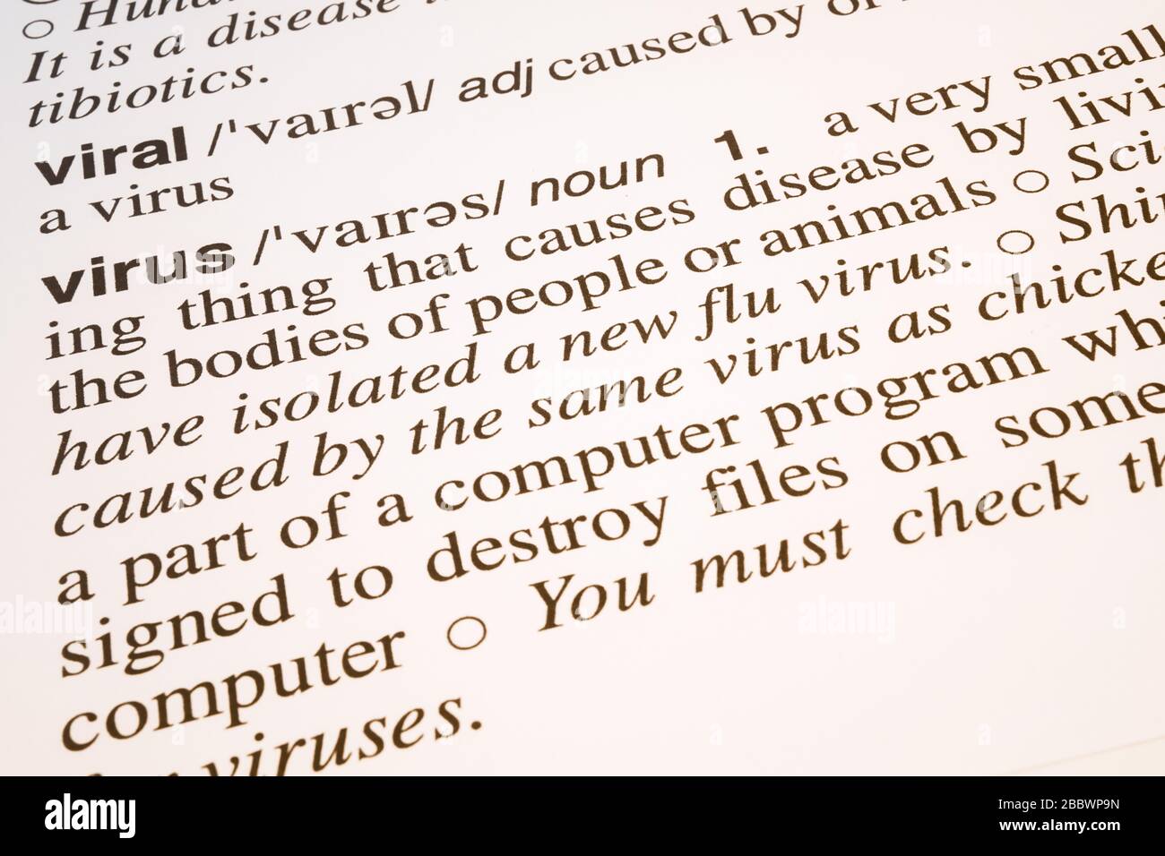 Viral and virus words meaning and definition text in English dictionary, Close up text of viral and virus words Stock Photo