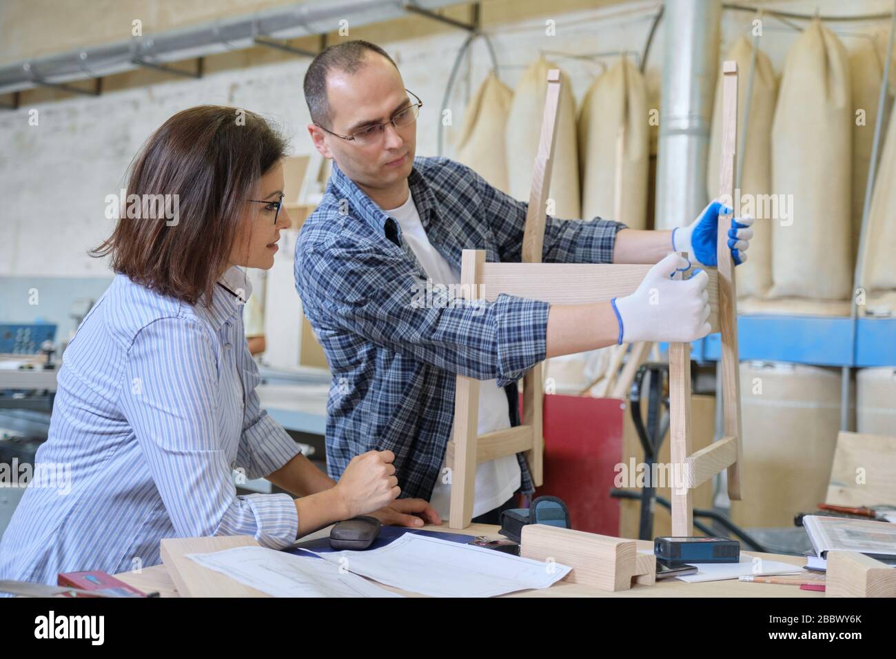Joiner woman furniture designer and carpenter designing
