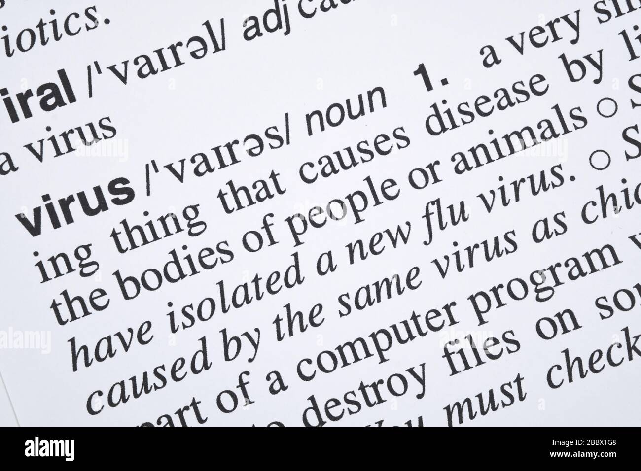 Virus word meaning and definition text in English dictionary, Close up text of virus word Stock Photo