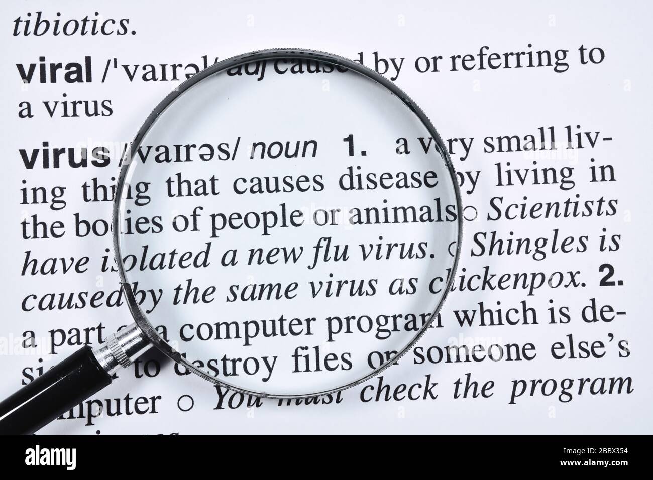 Virus word meaning and definition text in English dictionary, Close up text of virus word Stock Photo