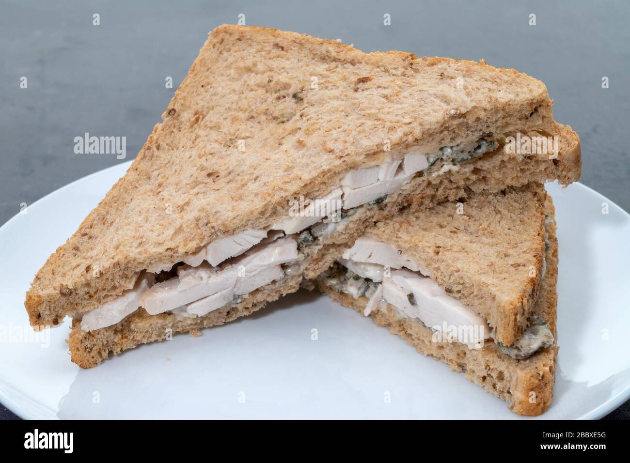 A chicken and stuffing sandwich Stock Photo Alamy