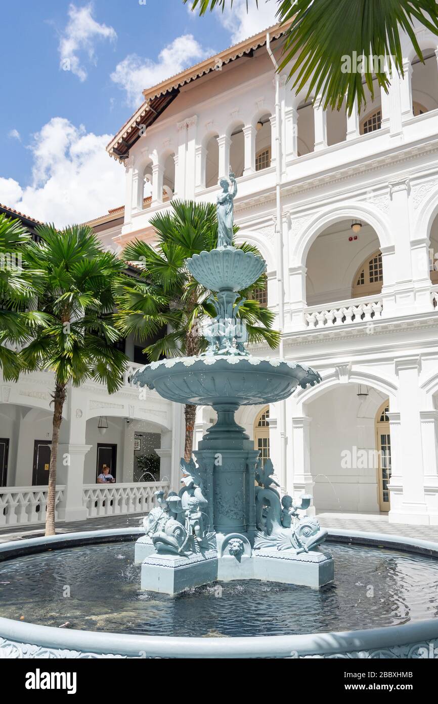Terrace with fountain at Raffles Hotel Singapore, Beach Road, Civic District, Central Area, Singapore Stock Photo
