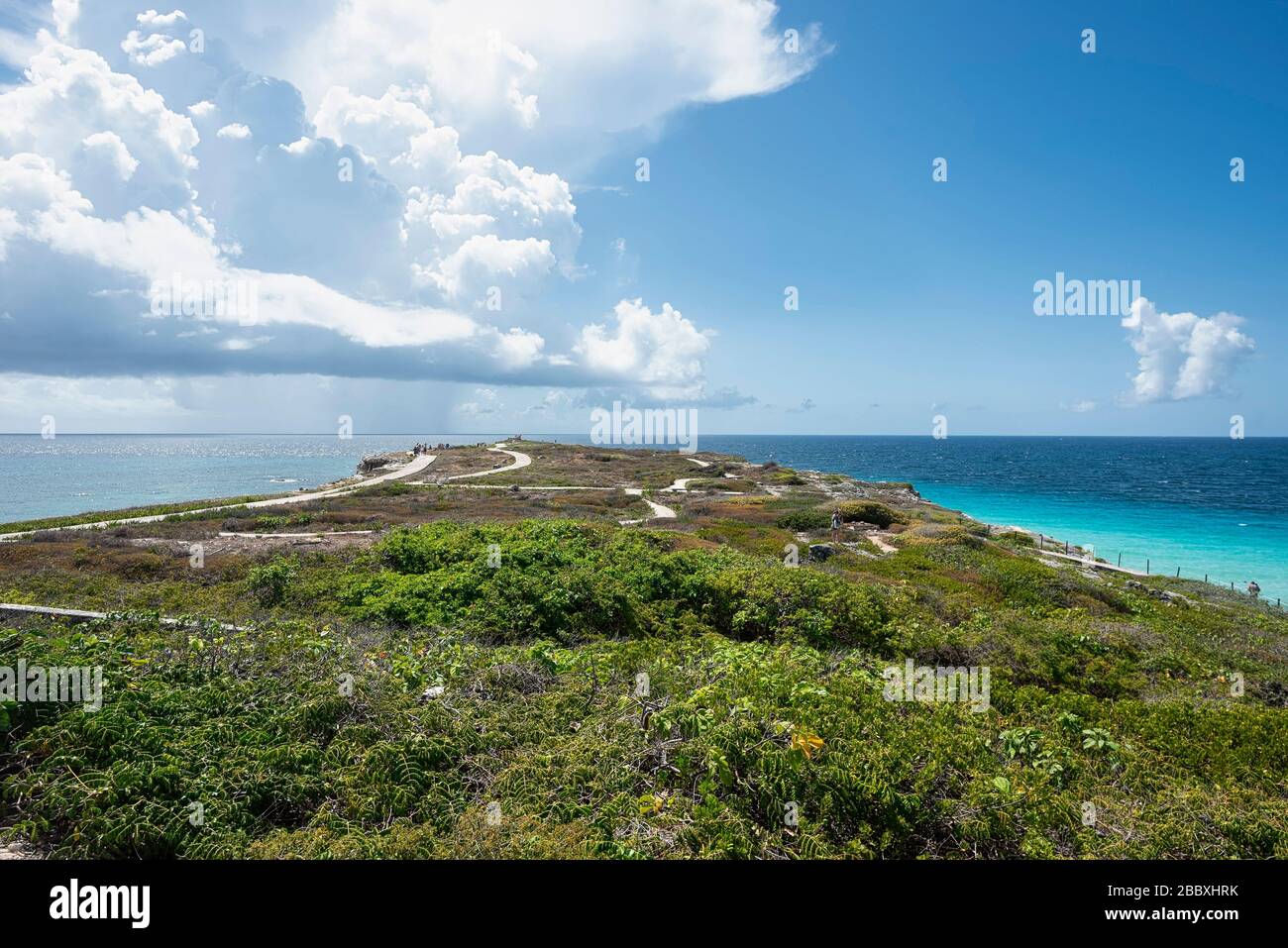 Panoramic view of the southern tip in Isla Mujeres Mexico. In the background the Caribbean sea and tourists strolling. Travel and vacation concept Stock Photo