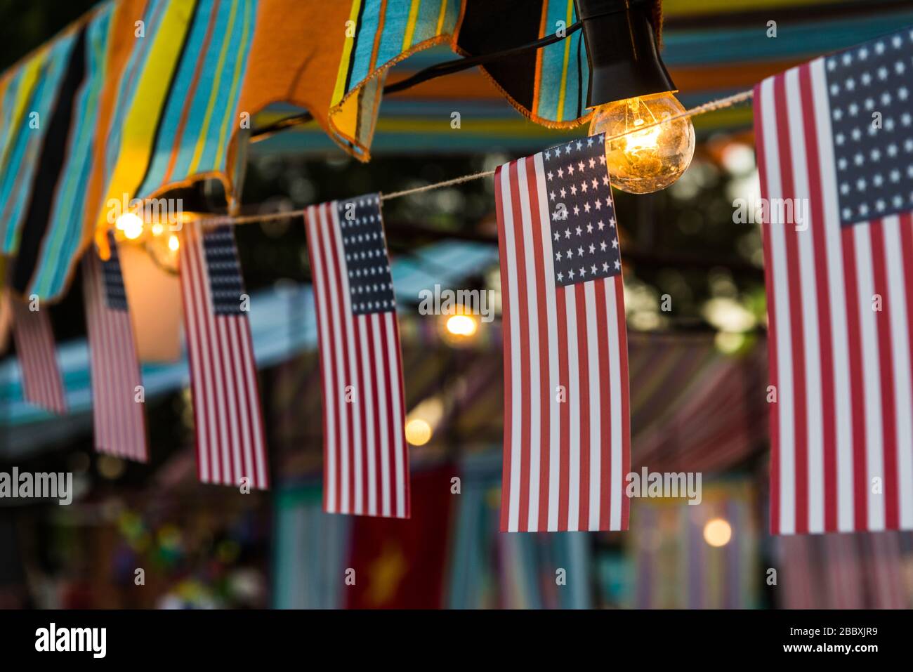 Close up of American US flags at a community festival. Stock Photo