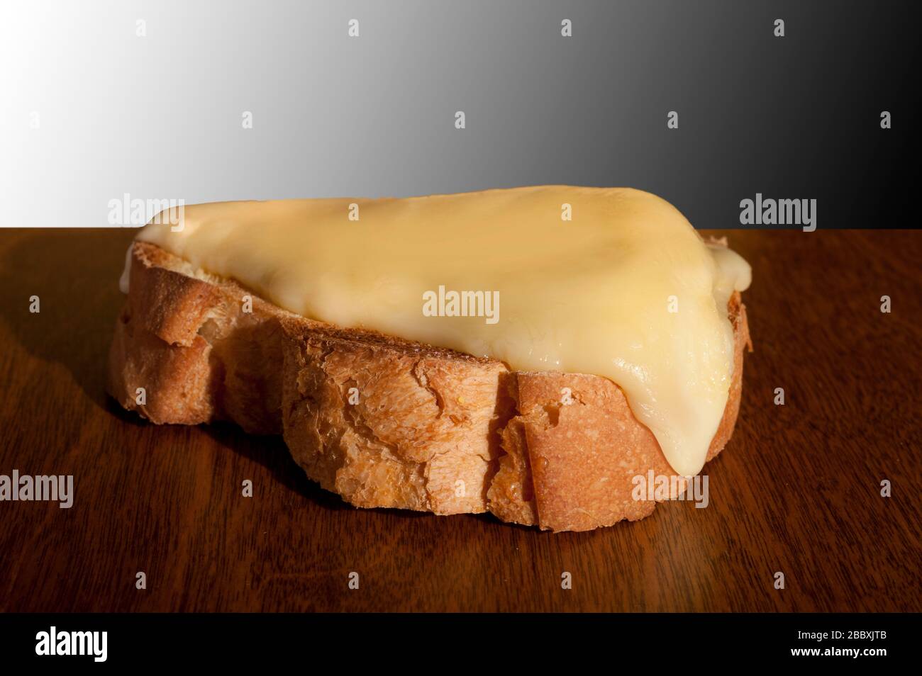 Melted Fontal Cheese on Crostini Stock Photo