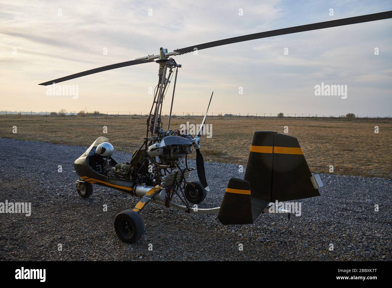Single ultralight homemade gyroplane stands at the airdrome Stock Photo