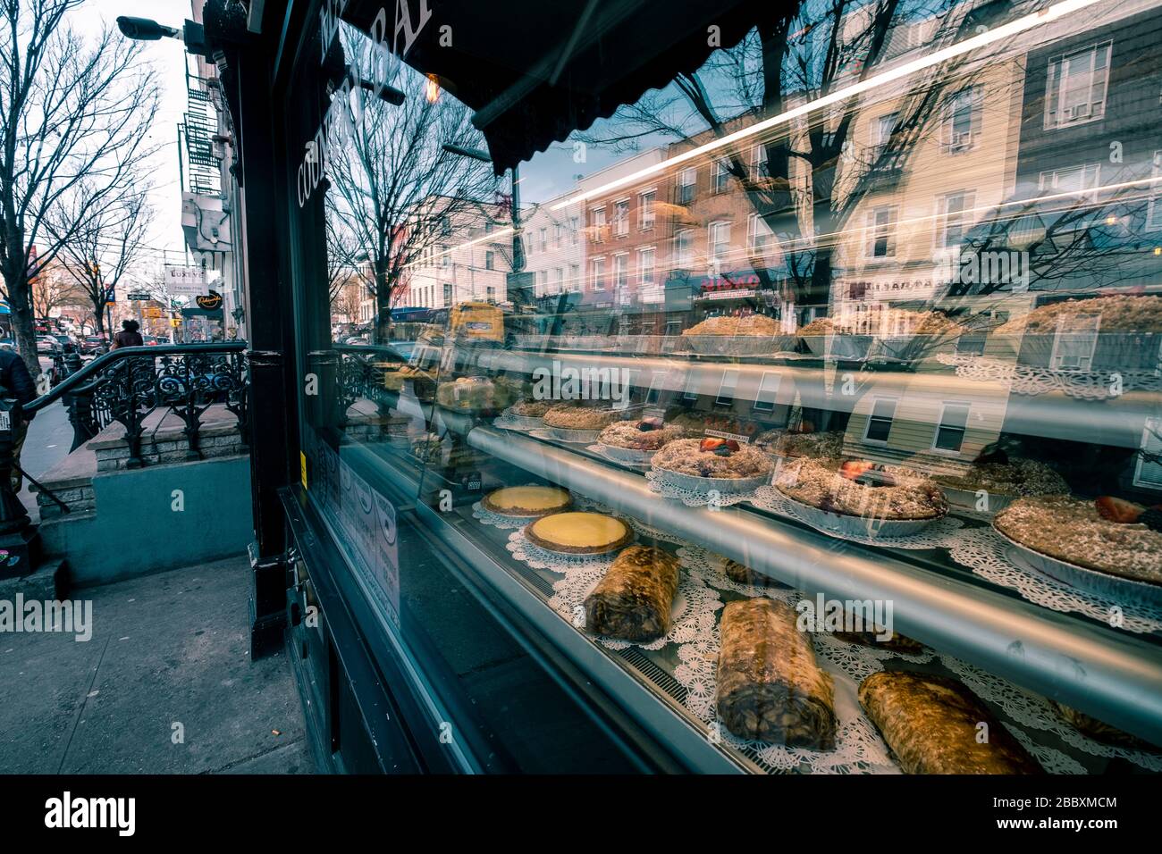 Modern bakery with different kinds of bread, cakes and buns, Brooklyn