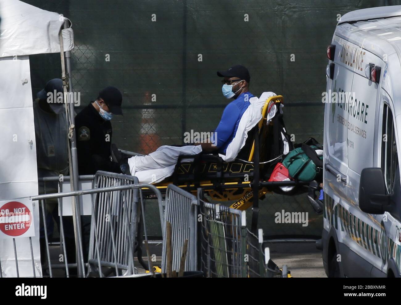 New York, United States. 01st Apr, 2020. A sick patient arrives in a stretcher by ambulance in Central Park in New York City on Wednesday, April 1, 2020. The tents are located along the East Meadow near Mt. Sinai Hospital and are being used as an overflow medical center. They were erected in 48 hours by the non-profit charity Samaritan's Purse. Photo by John Angelillo/UPI Credit: UPI/Alamy Live News Stock Photo