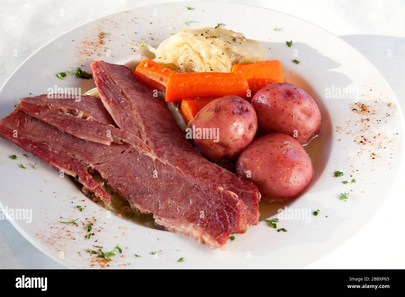 Plate of Corned beef and Cabbage with potatoes and carrots, by James D Coppinger/Dembinsky Photo Assoc Stock Photo
