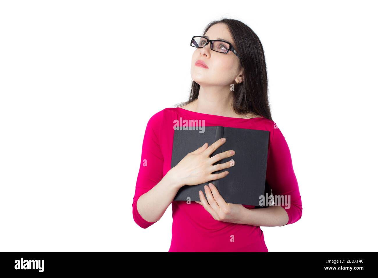 Attractive young woman in glasses with a book. Stock Photo
