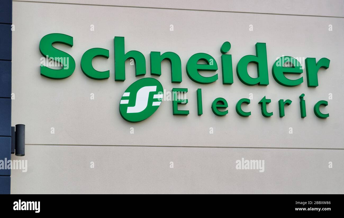 Schneider Electric exterior building sign on their business in Houston, TX. Developer of electrical equipment and industrial machine automation Stock Photo