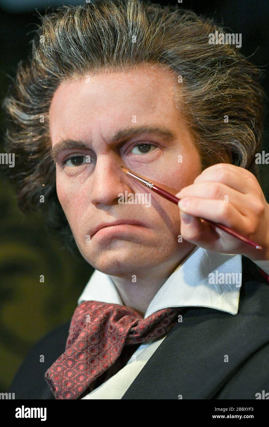 Berlin, Germany. 01st Apr, 2020. An employee is currently refreshing the  face colour of the wax figure of Ludwig van Beethoven, who celebrates his  250th birthday this year, in Madame Tussauds, which