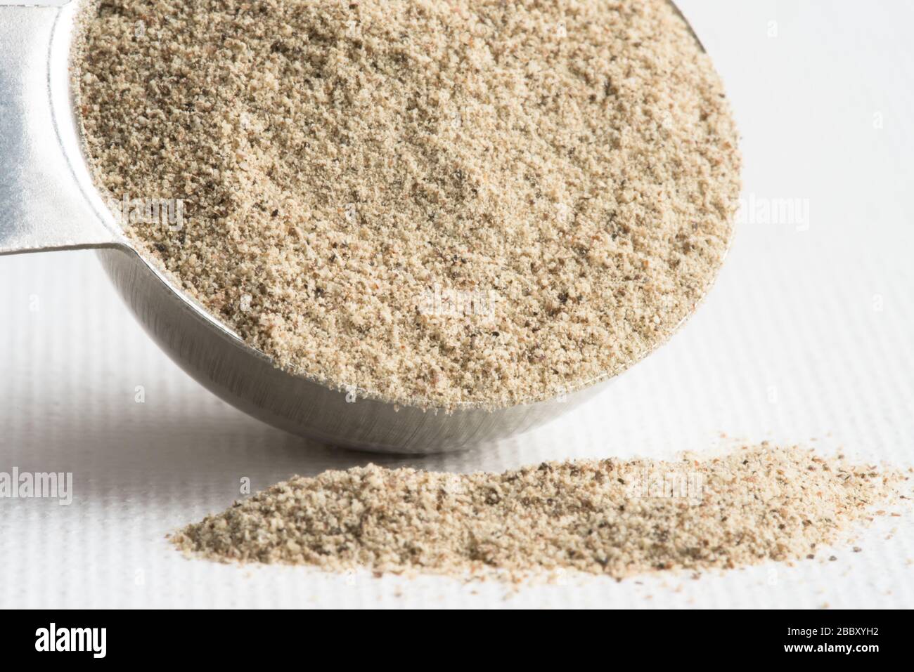 Ground White Pepper Spilled from a Teaspoon Stock Photo Alamy