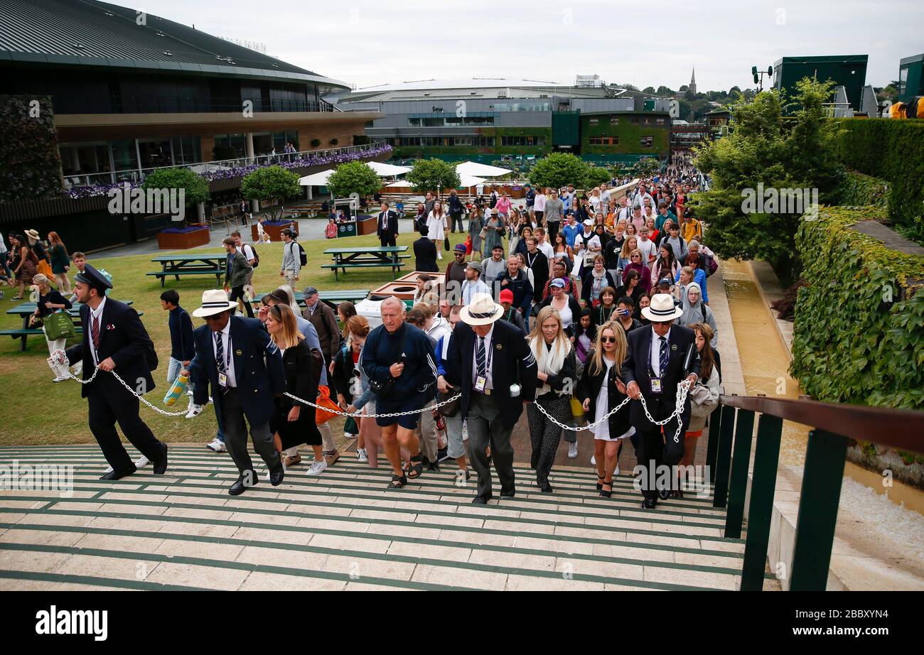 London, UK. 9th July, 2019. File photo taken on July 9, 2019 shows spectators arriving during Day 8 of the 2019 Wimbledon Tennis Championships in London, Britain. This year's Wimbledon has been cancelled due to the public health concerns related to the ongoing COVID-19 pandemic, the All England Club (AELTC) announced after an emergency meeting on Wednesday. Credit: Han Yan/Xinhua/Alamy Live News Stock Photo