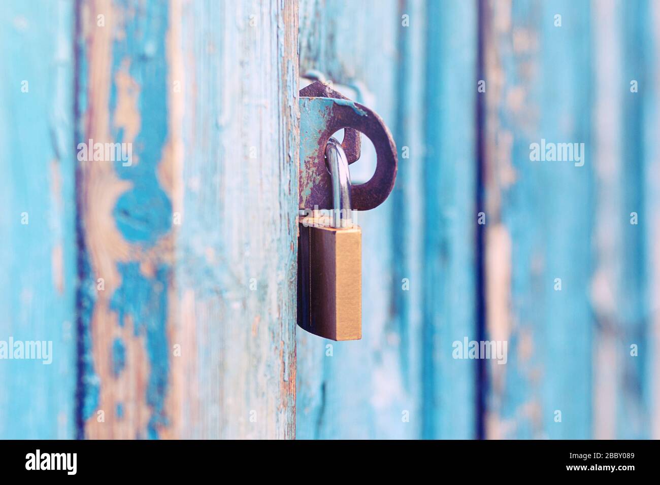 padlock on closed door Stock Photo