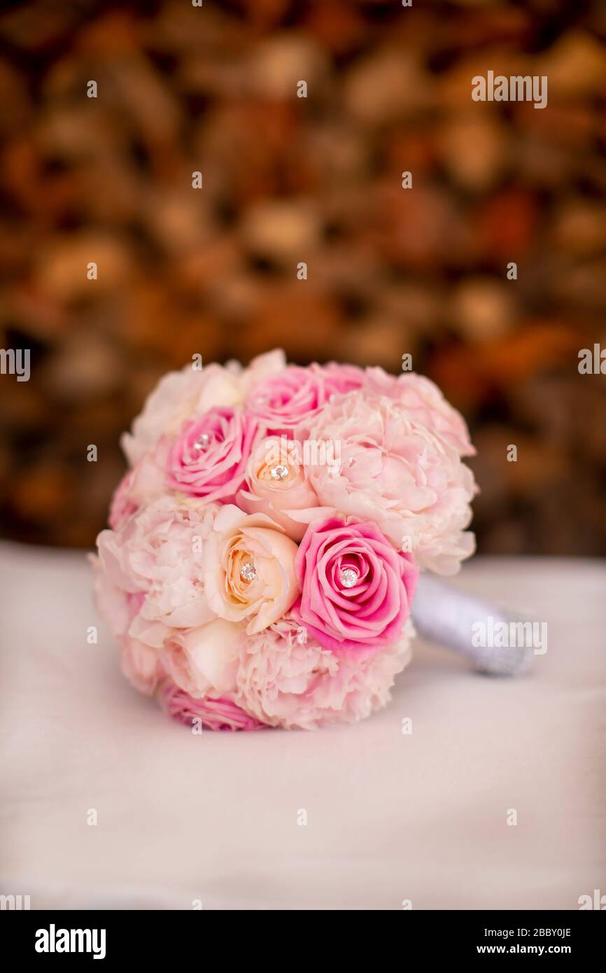 Wedding bouquet in pink and white roses with rhinestones for a bride to be Stock Photo
