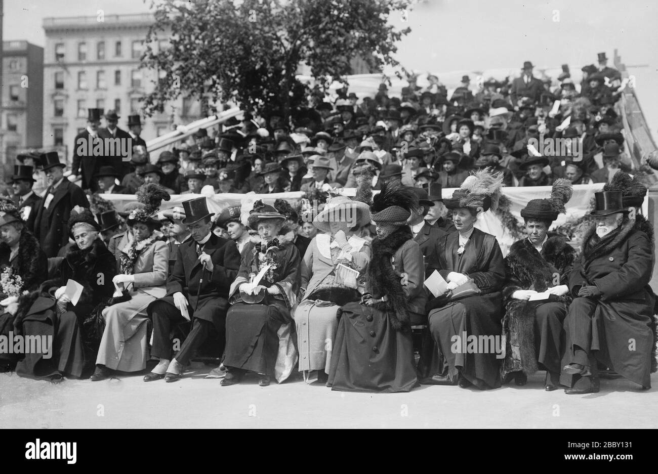 Unveiling of Karl Bitter's 1913 statue of Carl Schurz at Morningside Drive and 116th Street in New York City. People identified in the front row (named at the bottom of the negative) are: Miss Schurz, Mrs. Juessen (sister), Miss Juessen (niece), Carl L. Schurz, Miss Agathe Schurz, Mrs. Carl L. Schurz, Mrs. Jos. & Miss Choate, Andrew Carnegie & wife Stock Photo