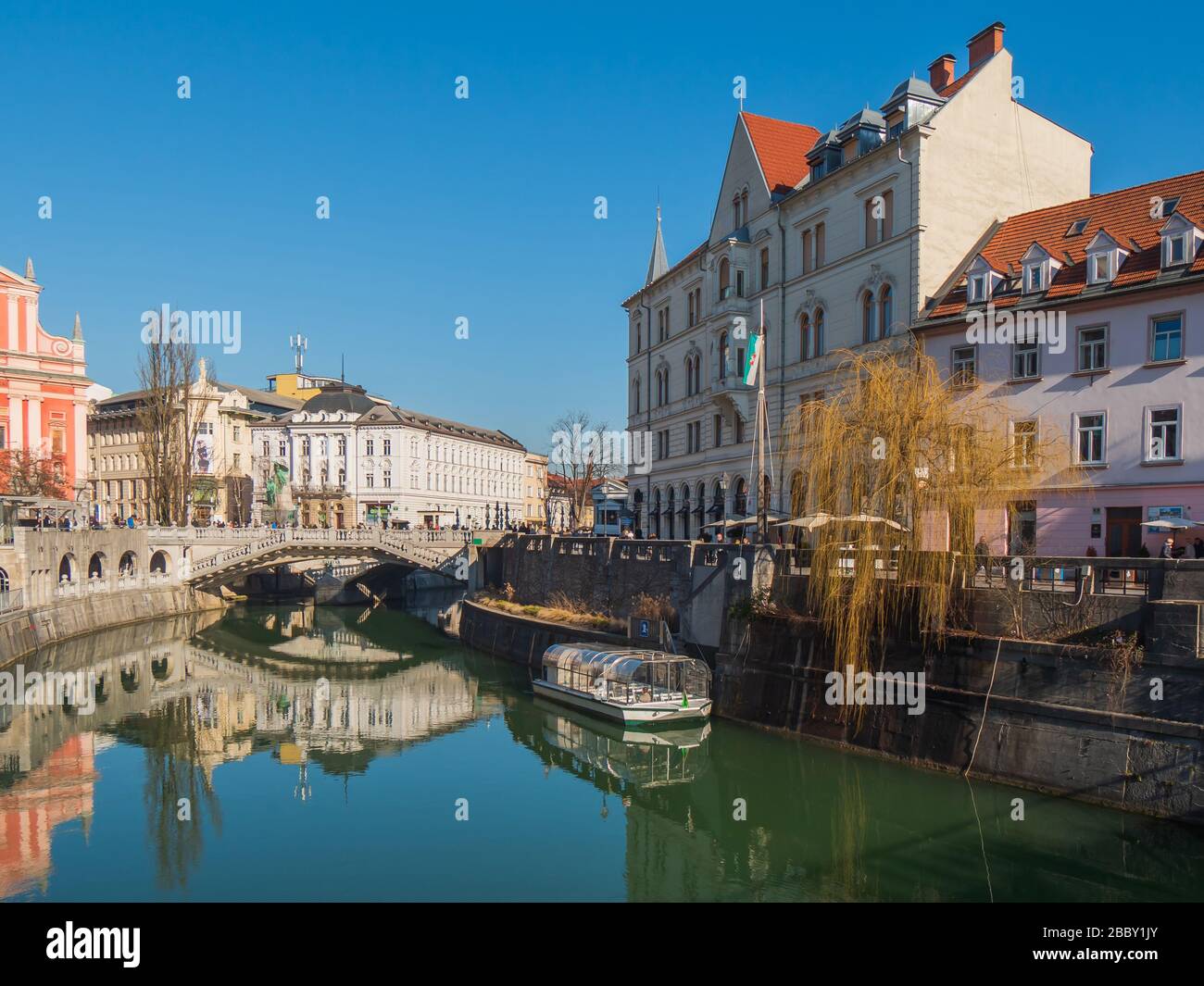 Ljubljana capital city of Slovenia, old town center brdige, square, church architecture view. Stock Photo