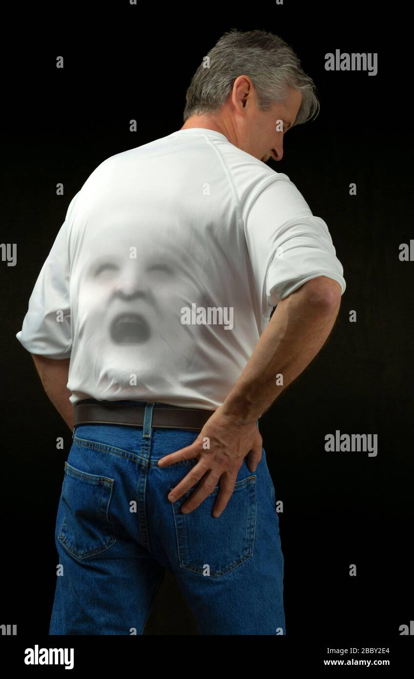 Man who threw his back out with a screaming backache visibly showing