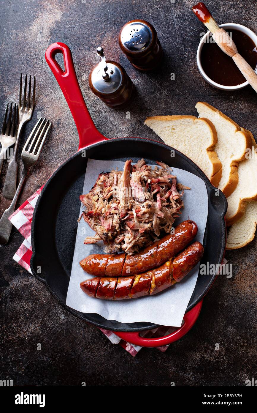 Pulled pork with cheesy sausage Stock Photo