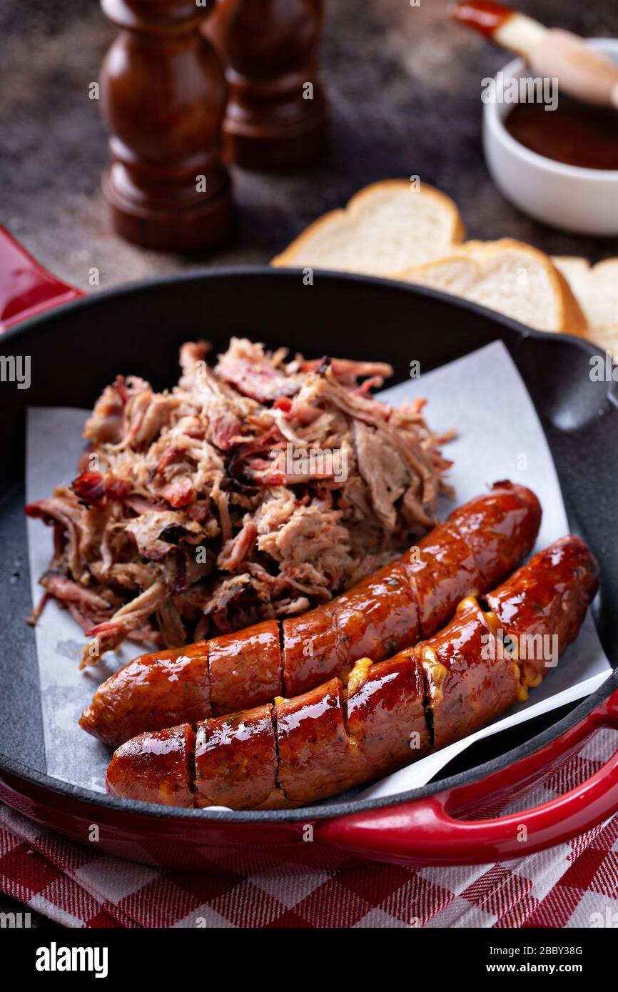 Pulled pork with cheesy sausage Stock Photo