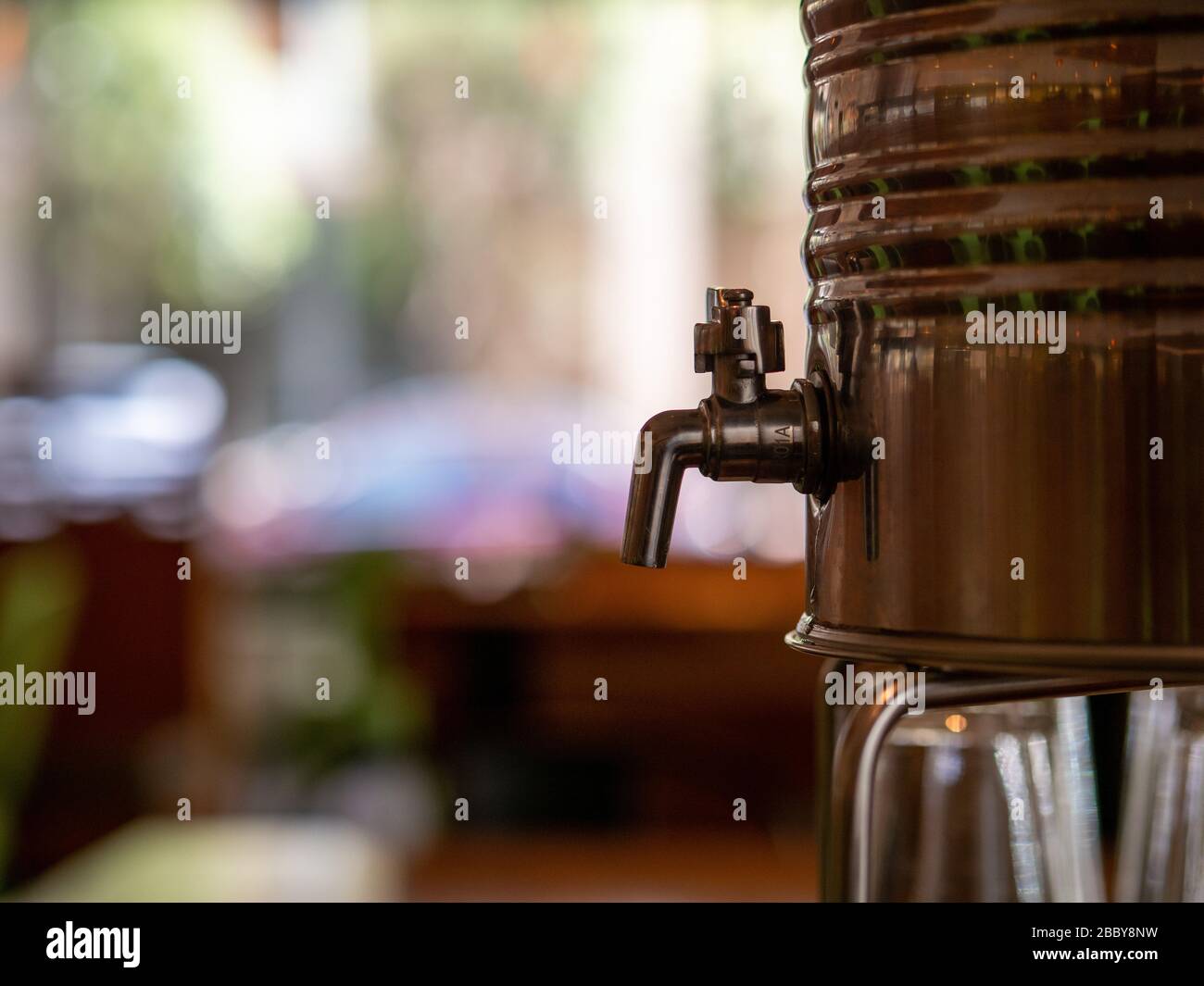 https://c8.alamy.com/comp/2BBY8NW/steel-water-cooler-with-manual-faucet-for-dispensing-drinking-water-2BBY8NW.jpg
