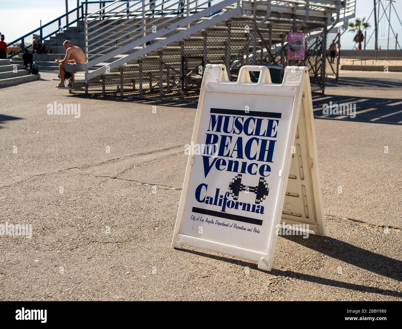 Muscle Beach Venice Beach signboard with bleachers in background Stock Photo