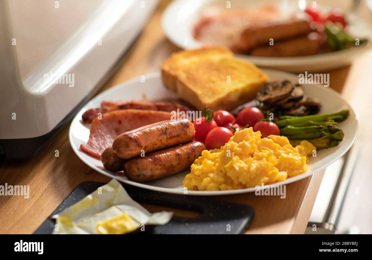 Breakfast menu on kitchen counter bar in morning.Healthy food,simple eating lifestyle. Stock Photo
