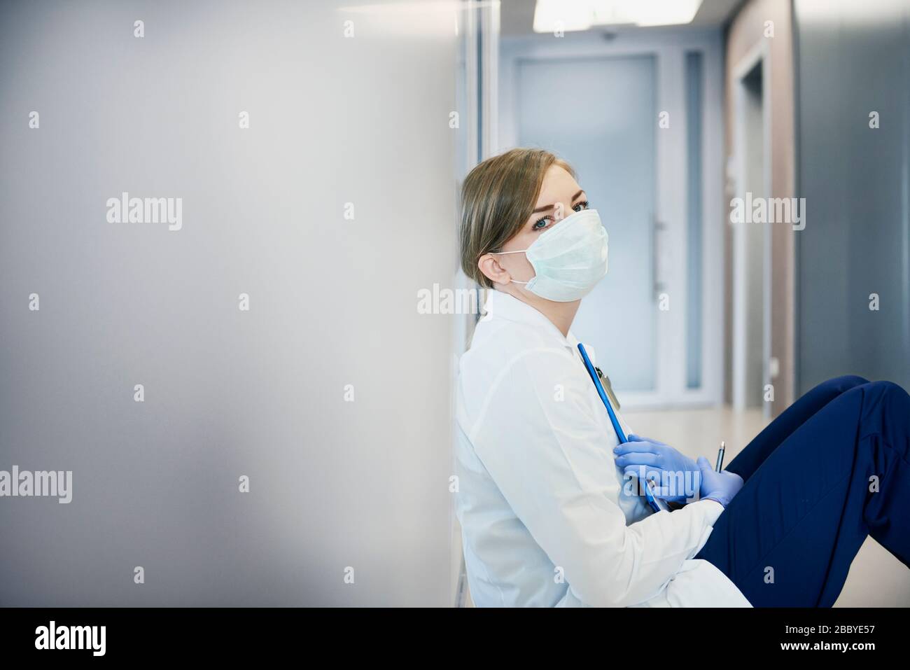Tired female doctor in hospital hi-res stock photography and images - Alamy