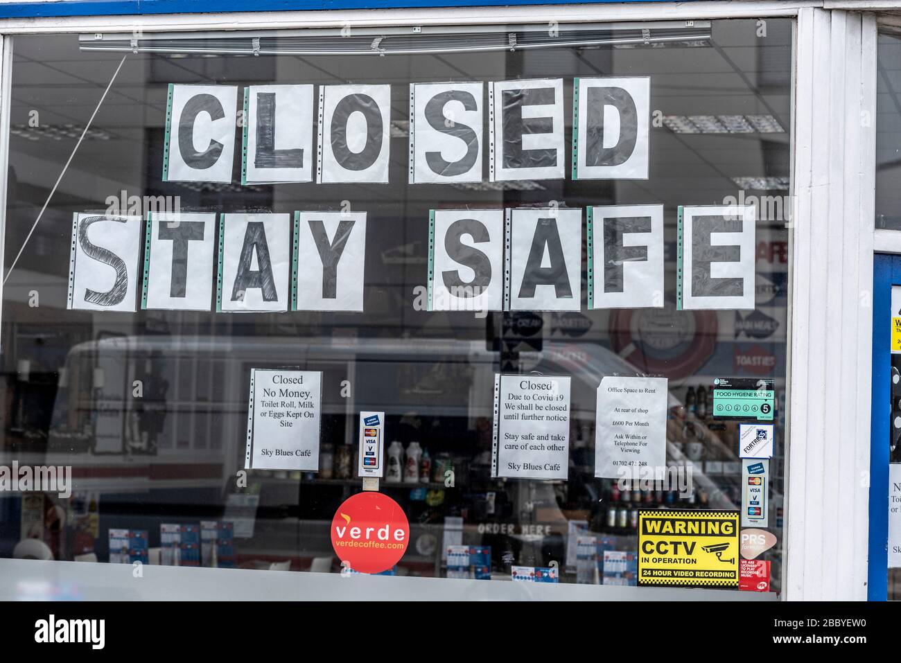 Blues Cafe, with Closed, Stay Safe, signs in window display. Westcliff