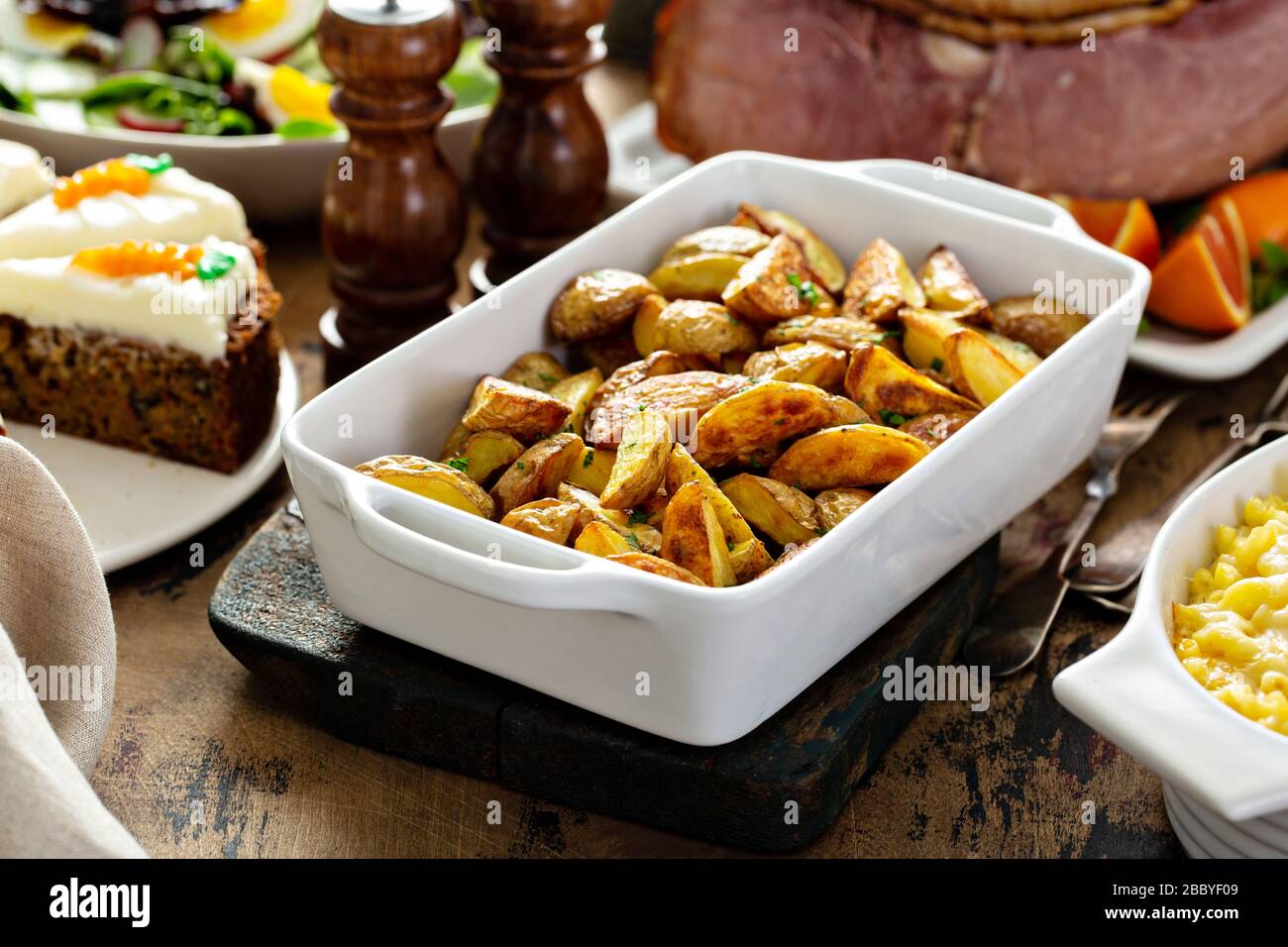 Roasted potatoes on a festive Easter table Stock Photo Alamy