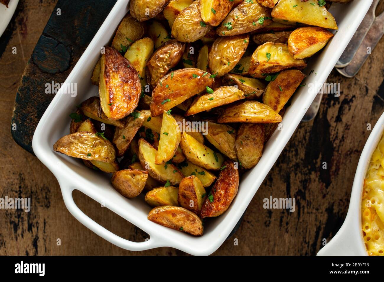 Roasted potatoes on a festive Easter table Stock Photo Alamy
