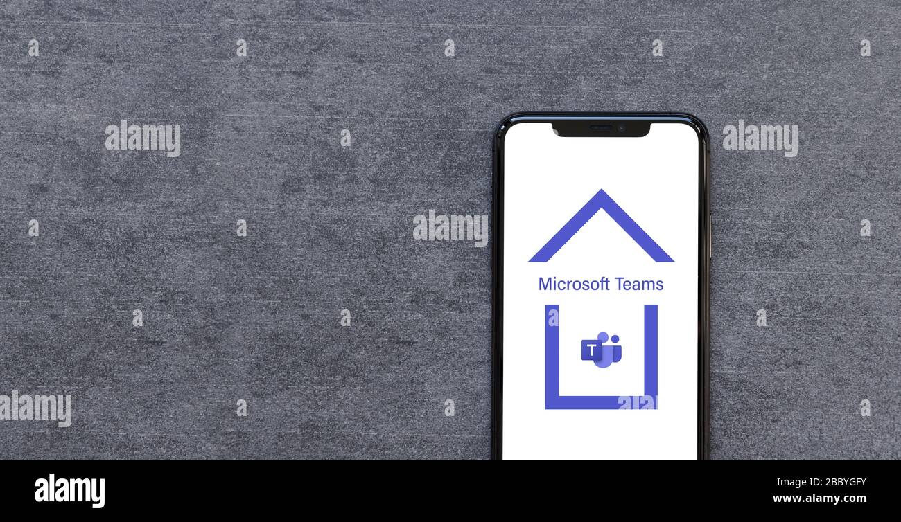 Rotterdam, The Netherlands - April 2020: Smartphone with Microsoft Teams App Logo inside House video conferencing service Work at Home Quarantine or L Stock Photo