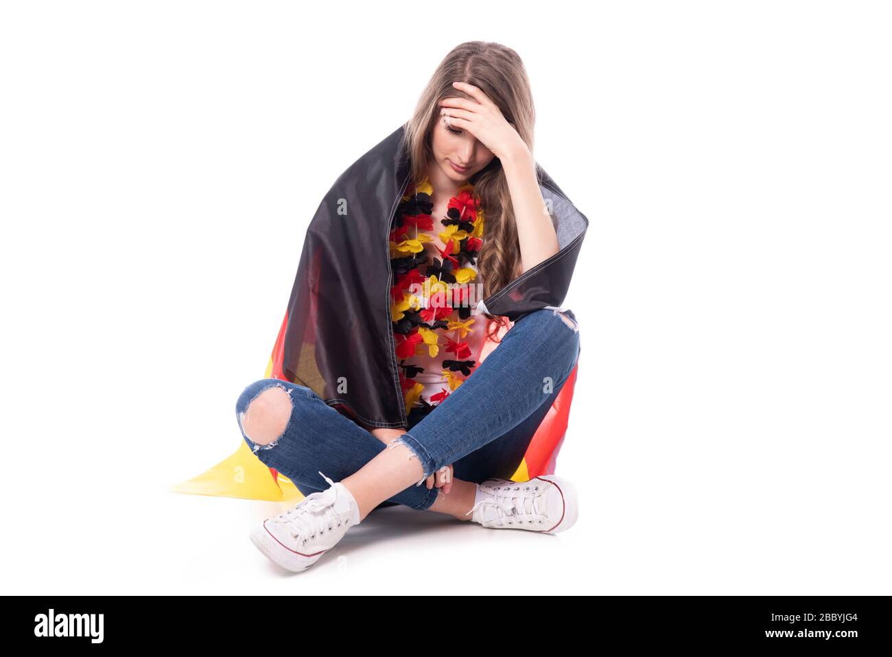 Sad Germany fan cries after the team has lost Stock Photo