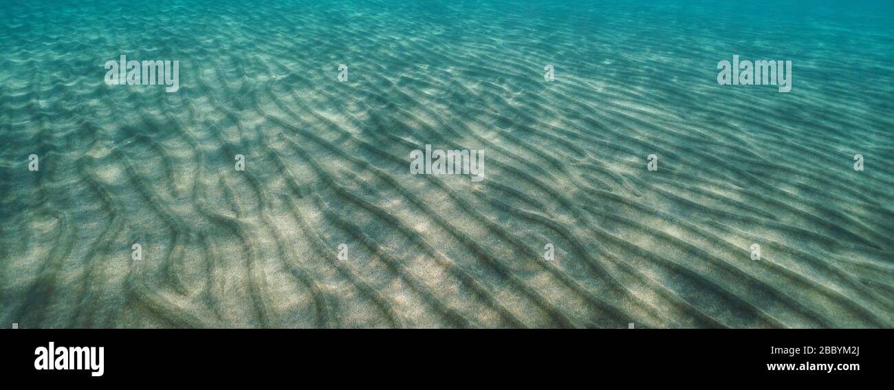 Ripples in the sand underwater on the seabed, natural scene, Mediterranean sea Stock Photo