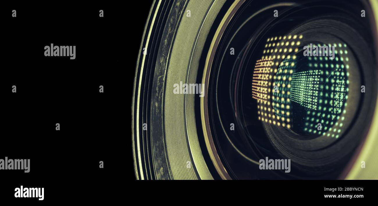 Beautiful camera lens with light reflection. Background pattern for