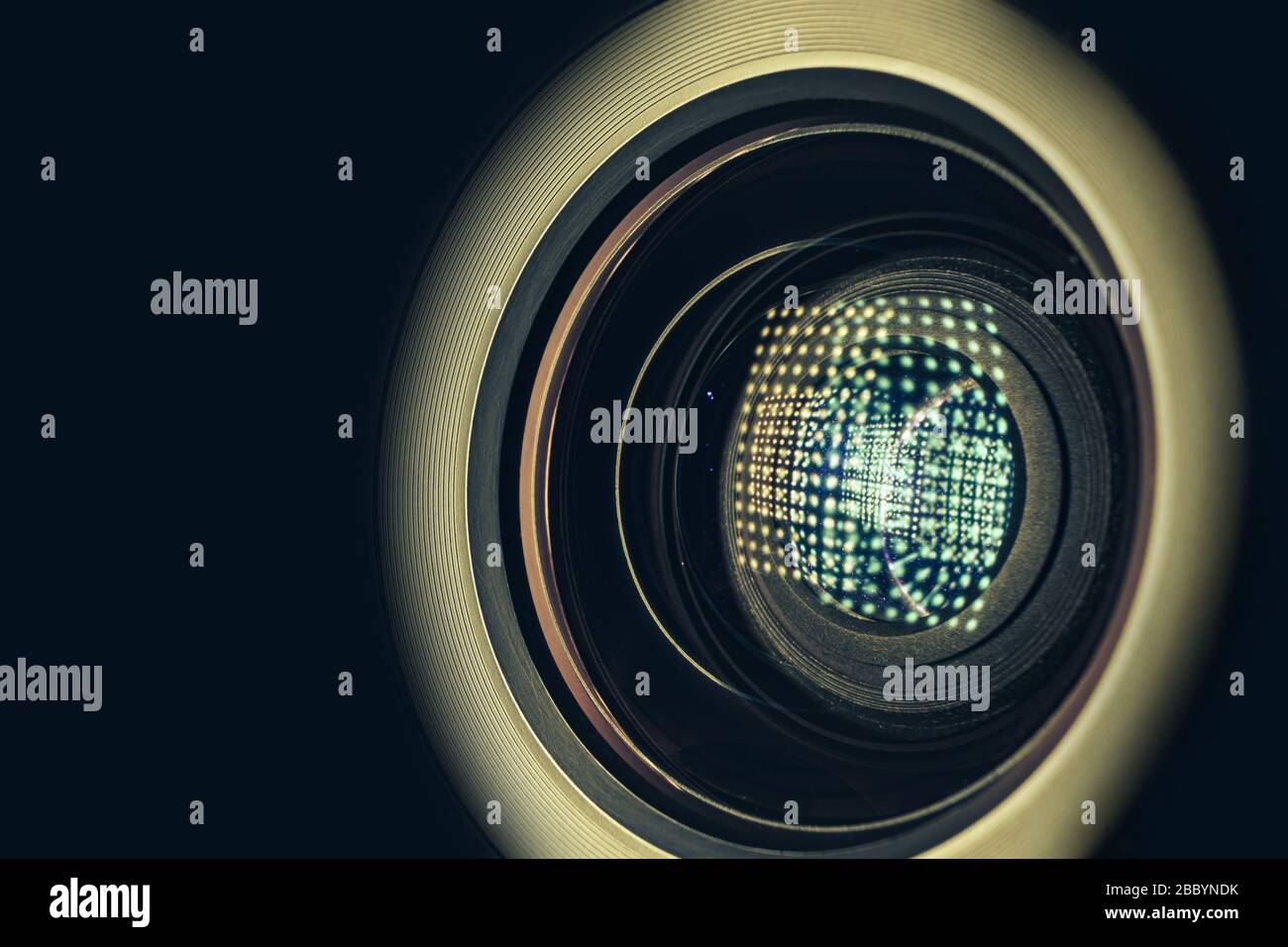 CLOSE UP Beautiful camera lens with light reflection on a black ...
