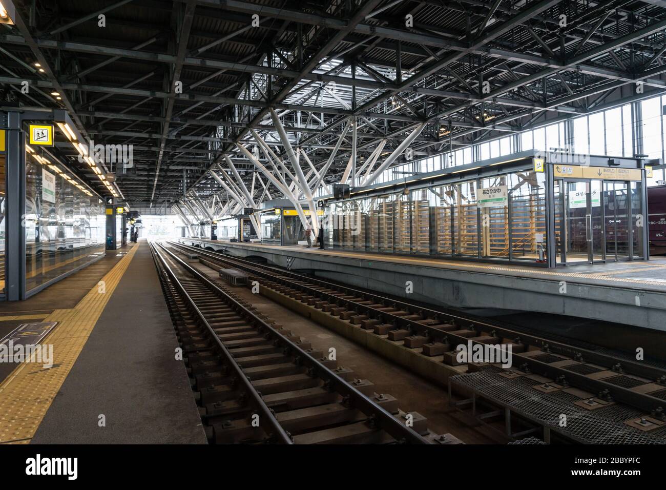 View of the train tracks from platform 4 in Asahikawa Station, Hokkaido, Japan Stock Photo
