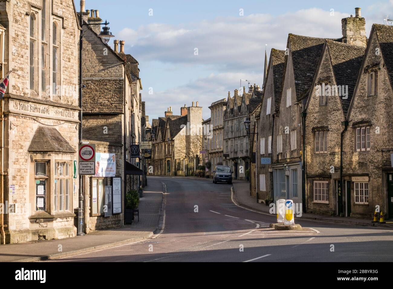 Empty street with no traffic and people due to lockdown caused by Covid 19 pandemic, Tetbury, Gloucestershire, UK Stock Photo