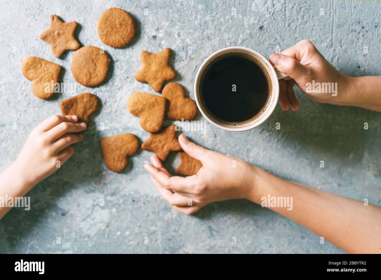 Hands coffee cookies Stock Photo