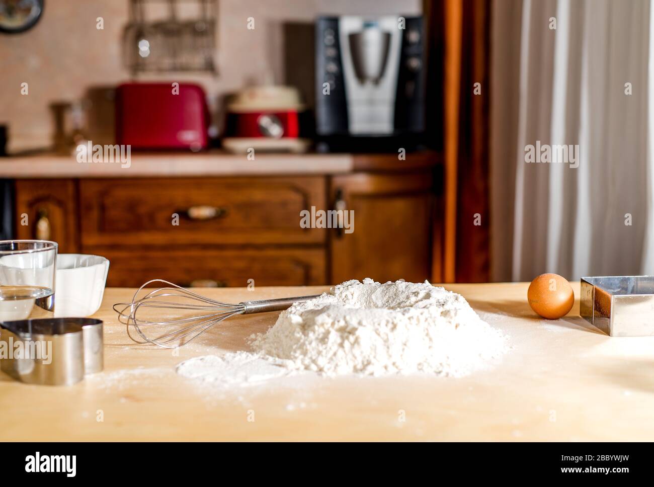 the process of making dough, flour and eggs Stock Photo